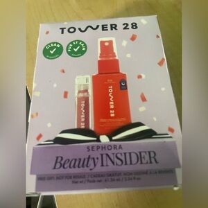 Tower 28  shine on lip jelly in shade pistachio. Tower 28 sos daily facial spray